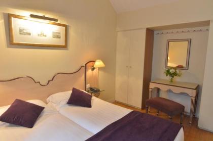 Hotel Suites Unic Renoir Saint-Germain - image 12