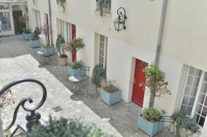 Hotel Suites Unic Renoir Saint-Germain - image 16