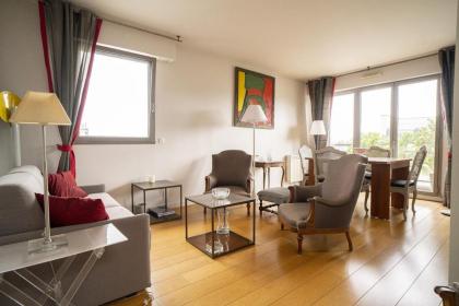 Apartment overlooking the rooftops of Paris - image 2