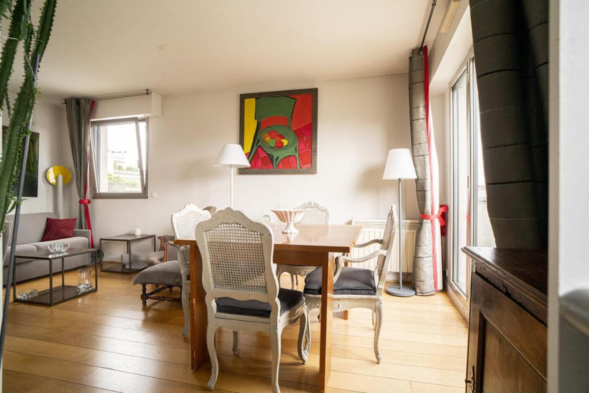 Apartment overlooking the rooftops of Paris - image 5